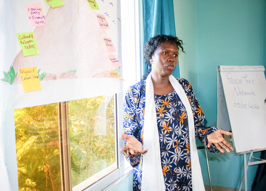 Sumeiya Omar presents findings from a group exercise examining barriers to women’s leadership and political participation.